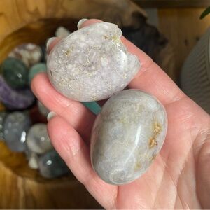 Set of two flower agate with quartz palm stones pocket size palms